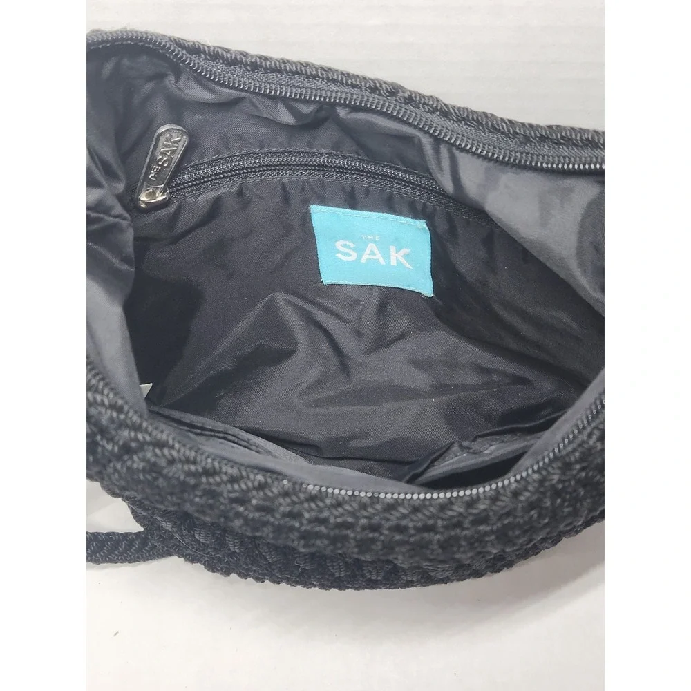 The‎ Sak Black Woven One Strap Crescent Purse